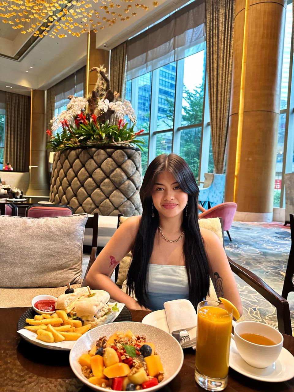 Sienna, Filipina escort, during a luxury dinner date at Shangri-La The Fort, BGC