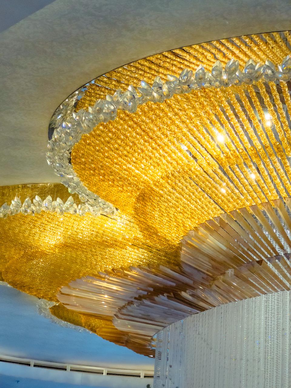 Golden chandelier detail at Shangri-La The Fort Lobby Lounge